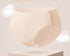 Ultra-thin cooling seamless brief in medium nude color, floating above white pedestal with cloud effects in light gray background