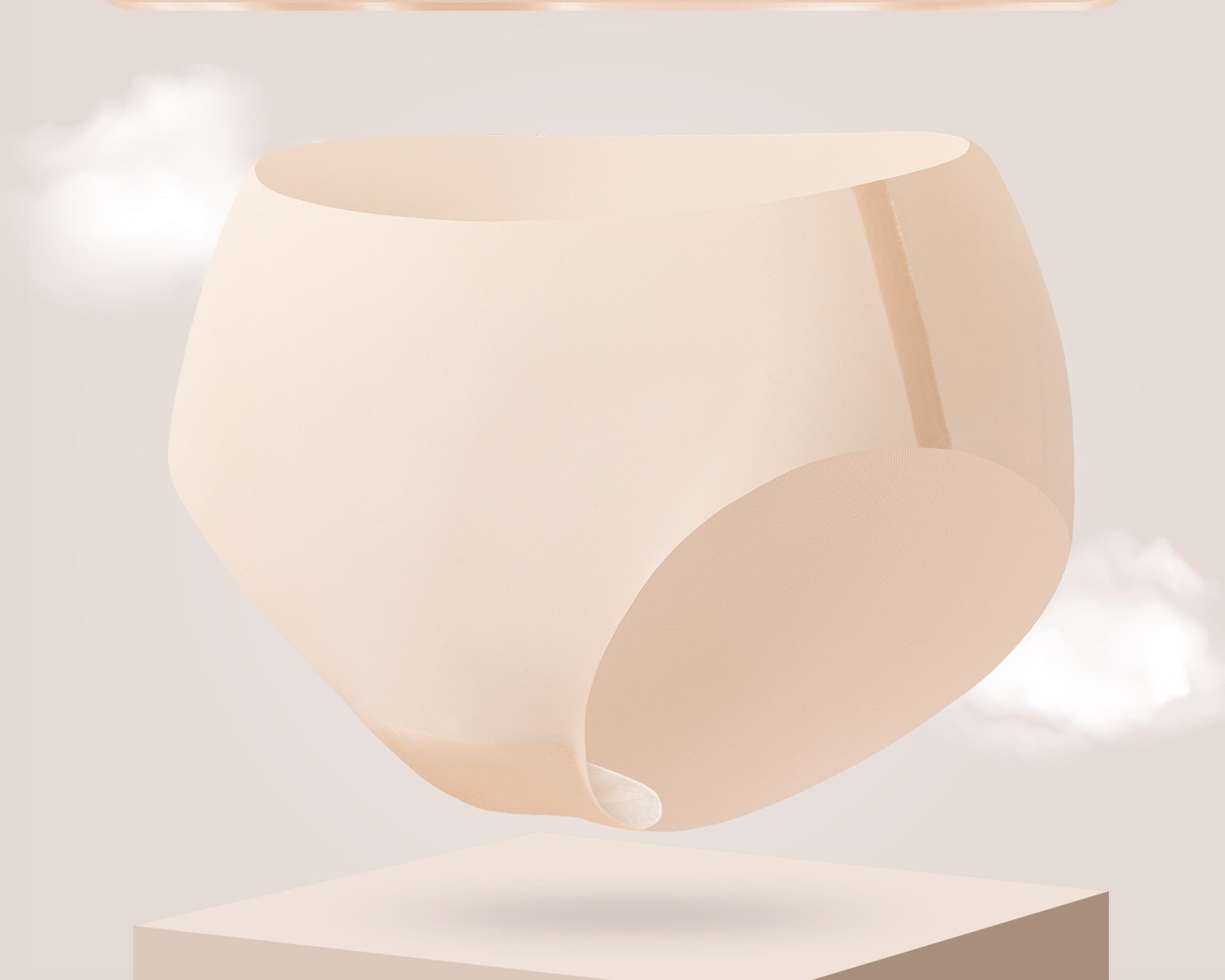 Ultra-thin cooling seamless brief in medium nude color, floating above white pedestal with cloud effects in light gray background