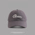 Gray baseball cap with white Dynamism script embroidery