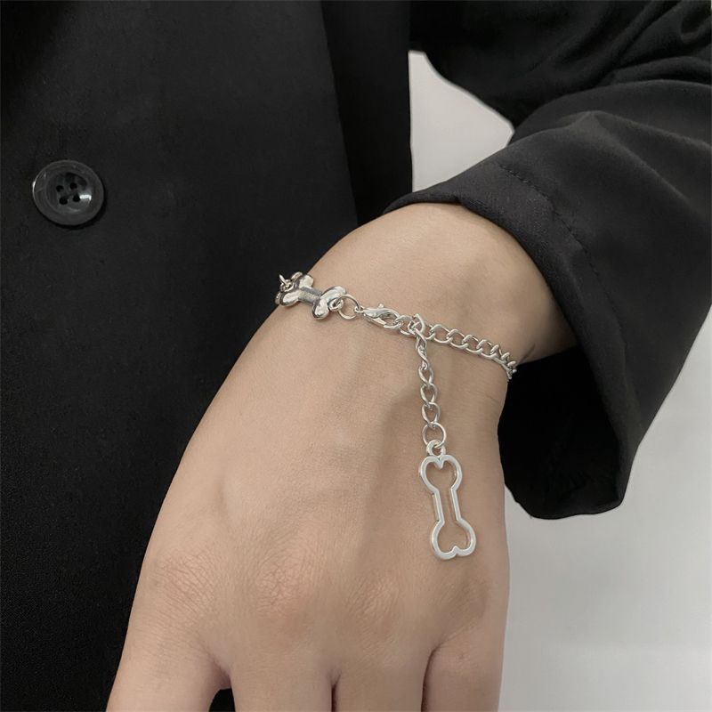 Detailed silver bracelet with bone-shaped links