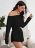 Side profile of woman in black loungewear set with textured fabric, posing on beige couch