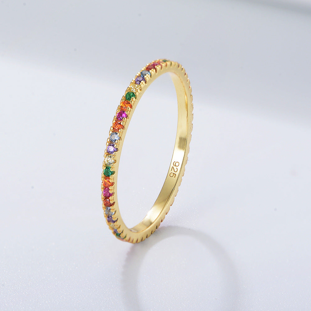 14k gold eternity ring with multicolor zircon including emerald, sapphire, ruby, and diamond in delicate prong setting, stamped 925