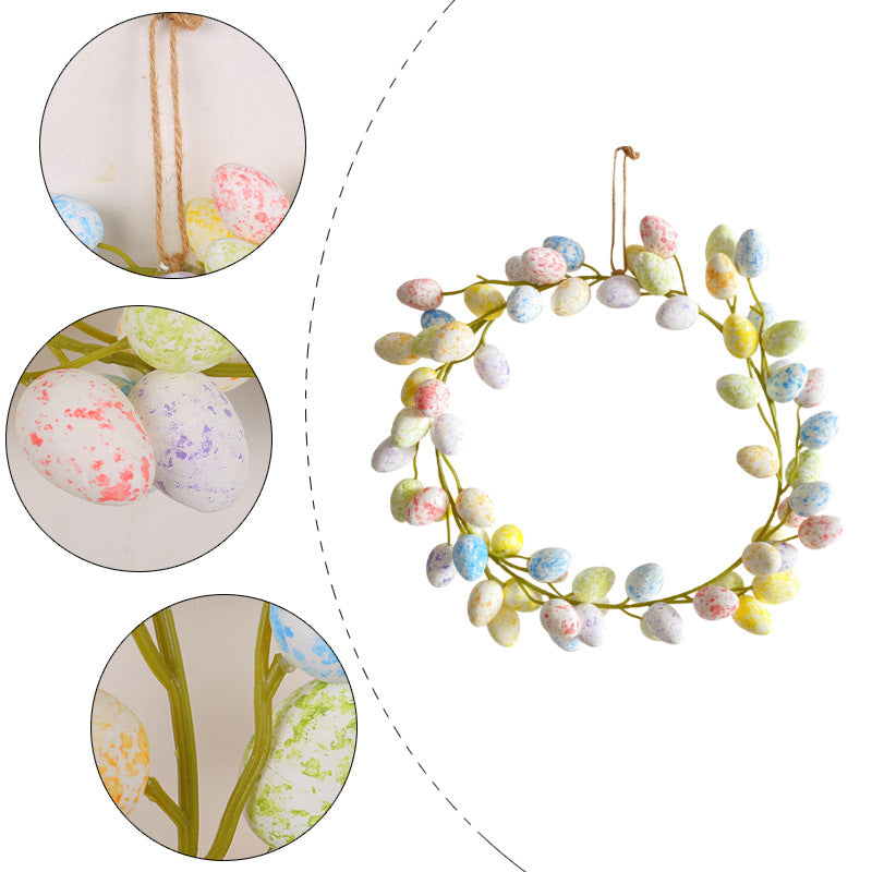 A close-up of a pastel Easter egg wreath with speckled eggs and a twine hanger, showing detailed craftsmanship.