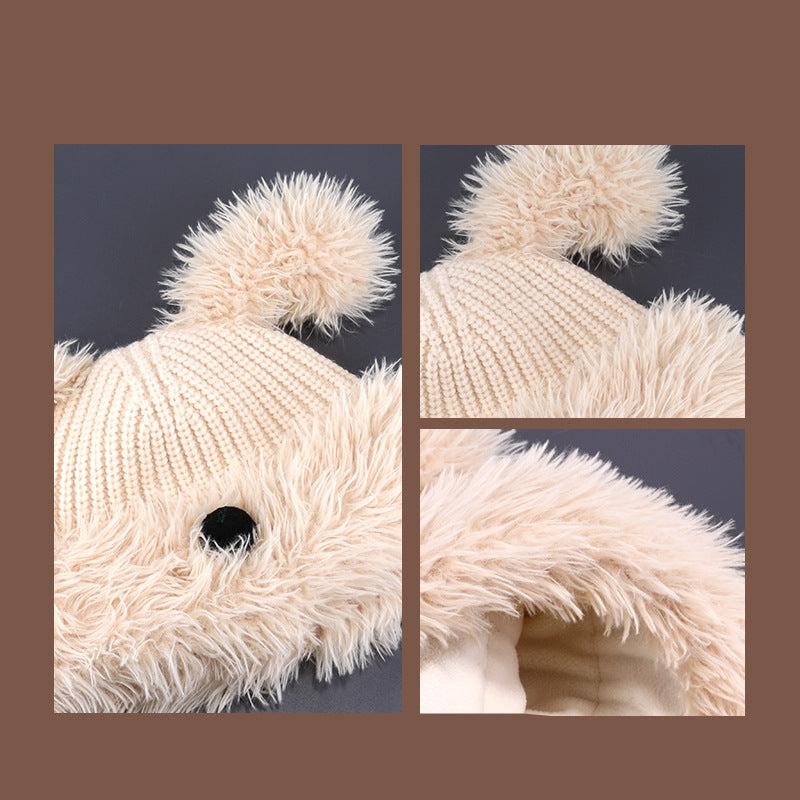Detailed views of beige-colored Dog Nose Plush Knit Beanie showing knit texture, fluffy pom poms, and faux fur trim