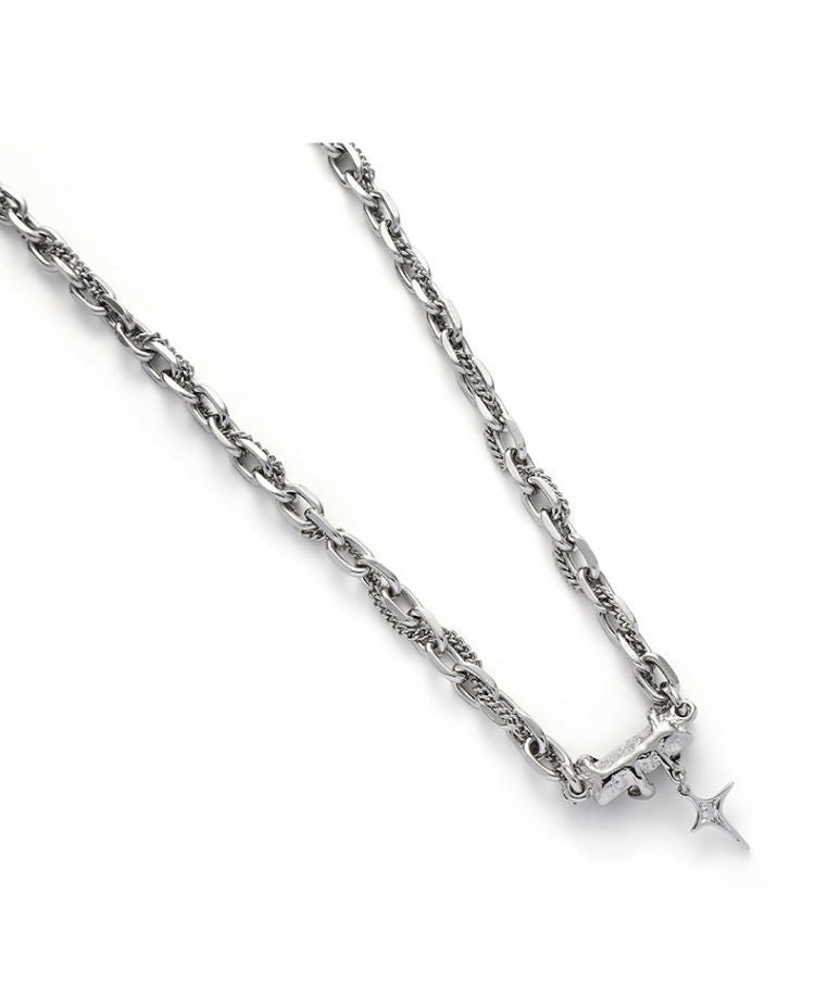 Detail view of silver chain necklace showing link pattern and pendant