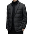 Black down puffer blazer with notched lapels and two-button closure worn with turtleneck