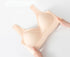 Beige seamless bra stretched by hands, showcasing high elasticity and comfort.