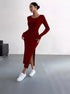 Deep red ribbed long-sleeve midi dress with high side slit, paired with white sneakers for modern style