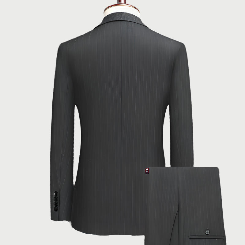 Back view of charcoal pinstripe suit jacket showing tailored silhouette and clean construction