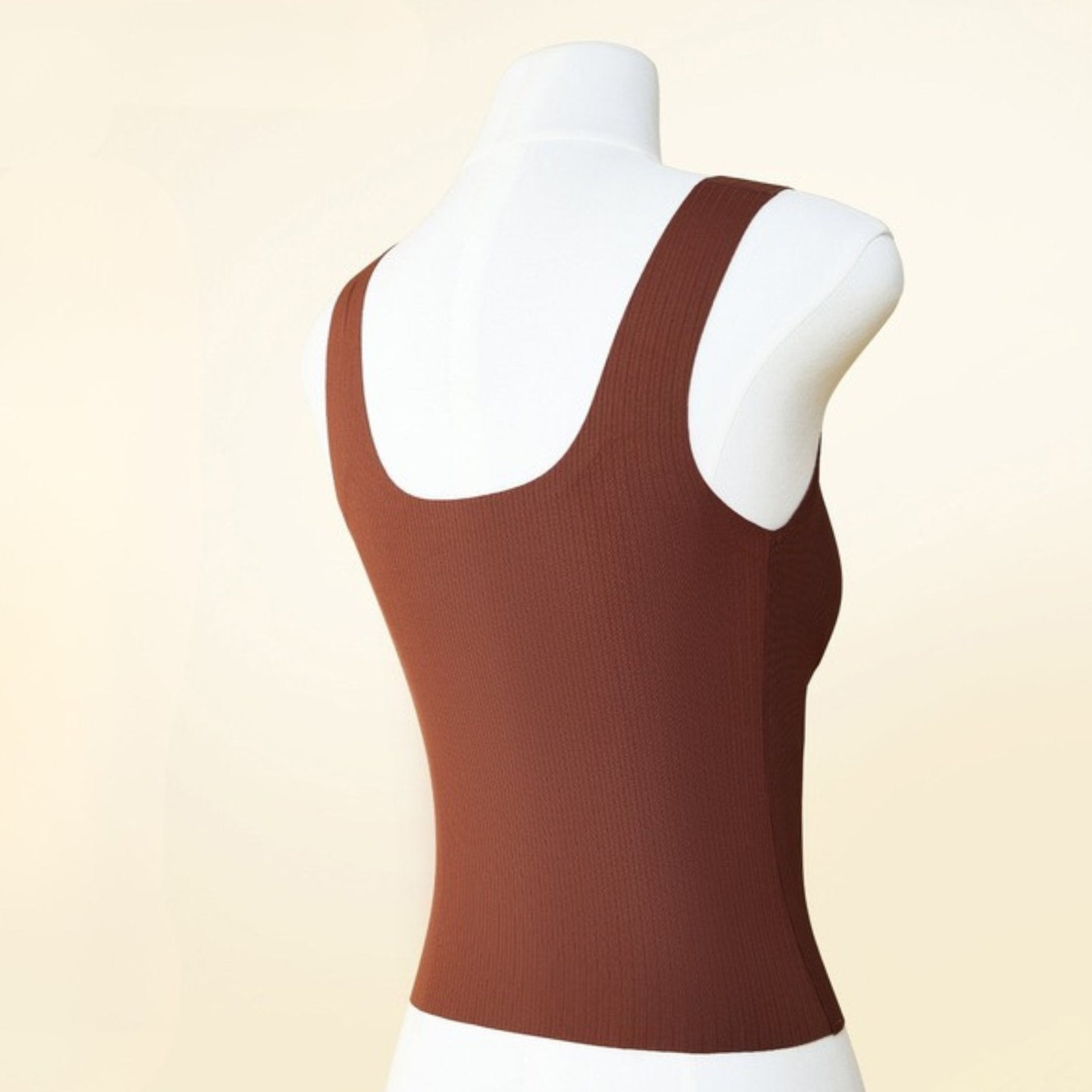 Back view of a brown U-back tank top with a seamless design, suitable for various shoulder types.