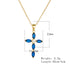 A gold sapphire cross pendant showing measurements of 22mm x 15.5mm with 40cm chain length and 2.3g weight