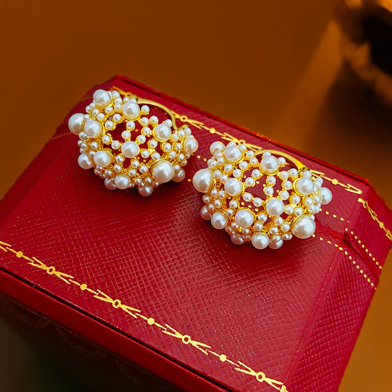 Pearl cluster earrings in jewelry presentation box