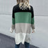 Back view of color-block cardigan, blonde wavy hair
