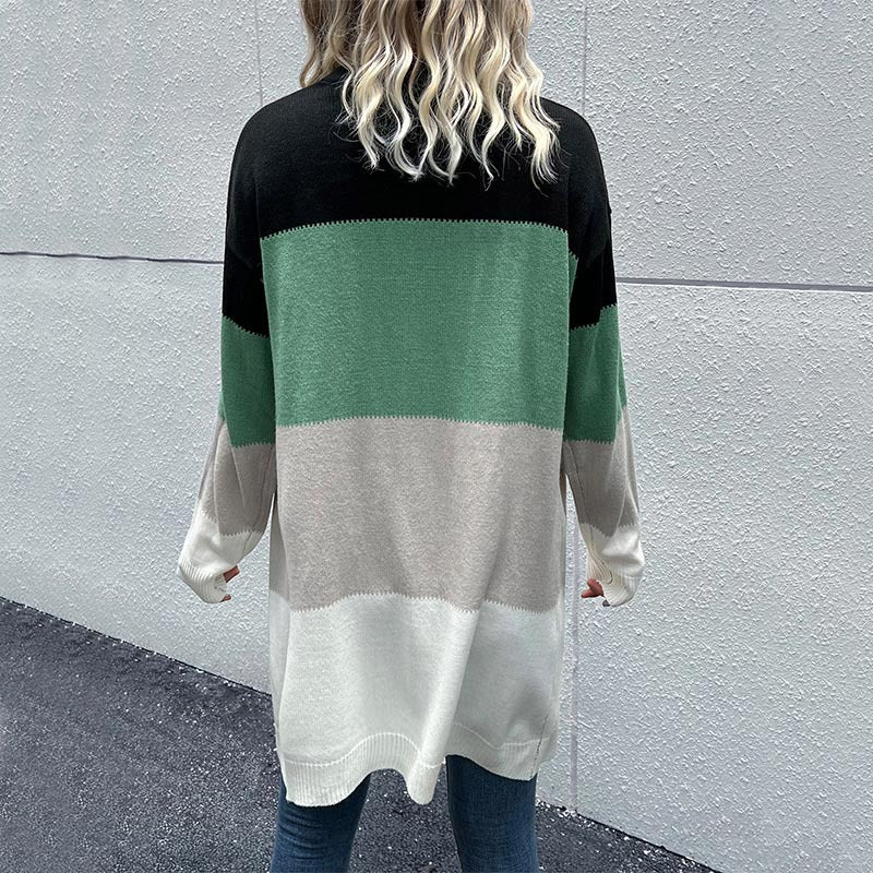 Back view of color-block cardigan, blonde wavy hair