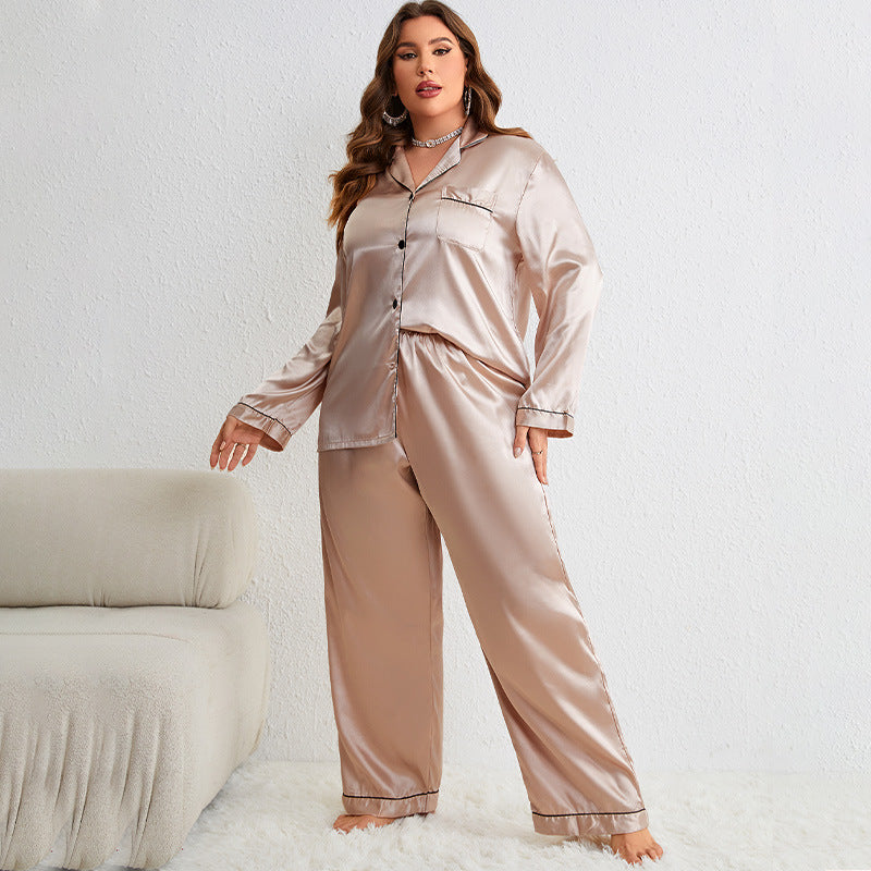Full-length front view of champagne satin pajama set on model with diamond necklace and earrings
