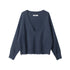 Front view of navy V-neck sweater with simple clean back design, ribbed hem and cuffs with distressed edges.