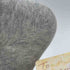 Detail shot of gray sock knit pattern and stitching