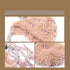 Black fuzzy winter hat with multicolored speckles and long braided multicolor earflaps, showcasing textural details