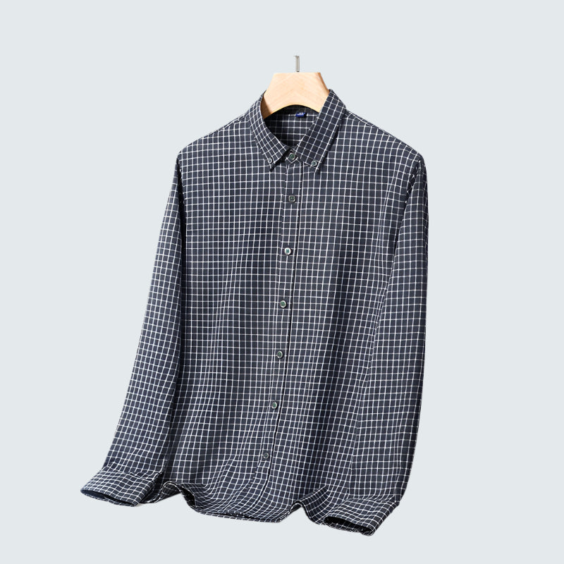 Charcoal gray checkered shirt with white grid lines on wooden hanger. Traditional button-down styling