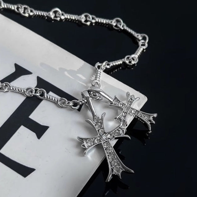 Titanium Steel Gothic cross pendant necklace featuring clear crystal inlay, ornate flared tips, and textured link chain