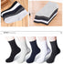 Multiple cotton crew socks in various colors laid out to display color range and texture