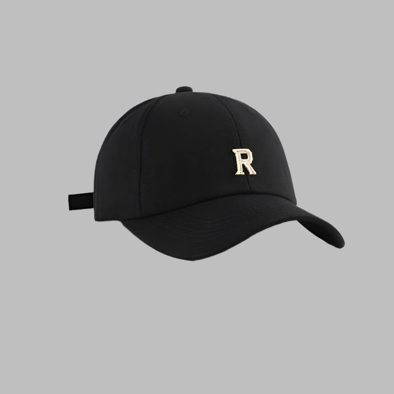 Black baseball cap with gold 'R' logo, curved brim and adjustable back closure desig