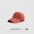 Coral pink cotton baseball cap with minimalist unbranded design