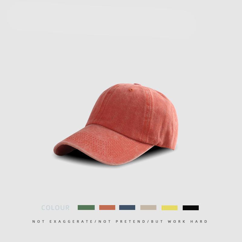Coral pink cotton baseball cap with minimalist unbranded design
