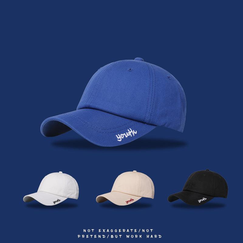 Blue baseball cap with "youth" embroidery on side, showing color options below on navy background