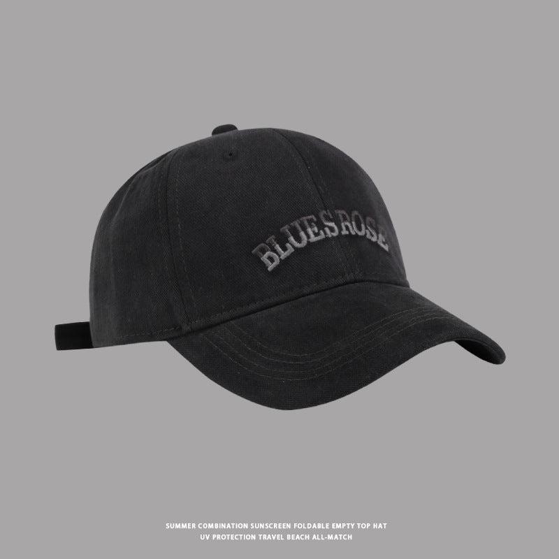 Black BluesRose embroidered baseball cap with a curved brim and soft washed cotton material