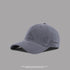 Gray baseball cap with embroidered signature logo, stylish and versatile