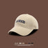 Beige baseball cap with navy COLORADO embroidery displayed against brown background with product features listed beneath