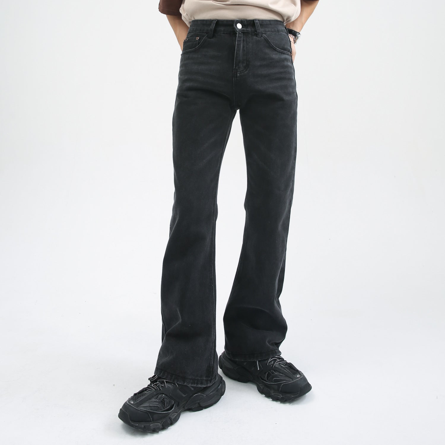 Black straight-leg denim jeans with sleek, minimalist design