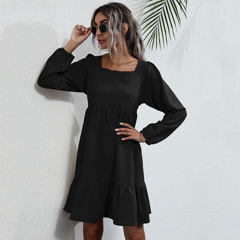 Stylish black babydoll dress with square neckline and relaxed fit, accessorized with sunglasses