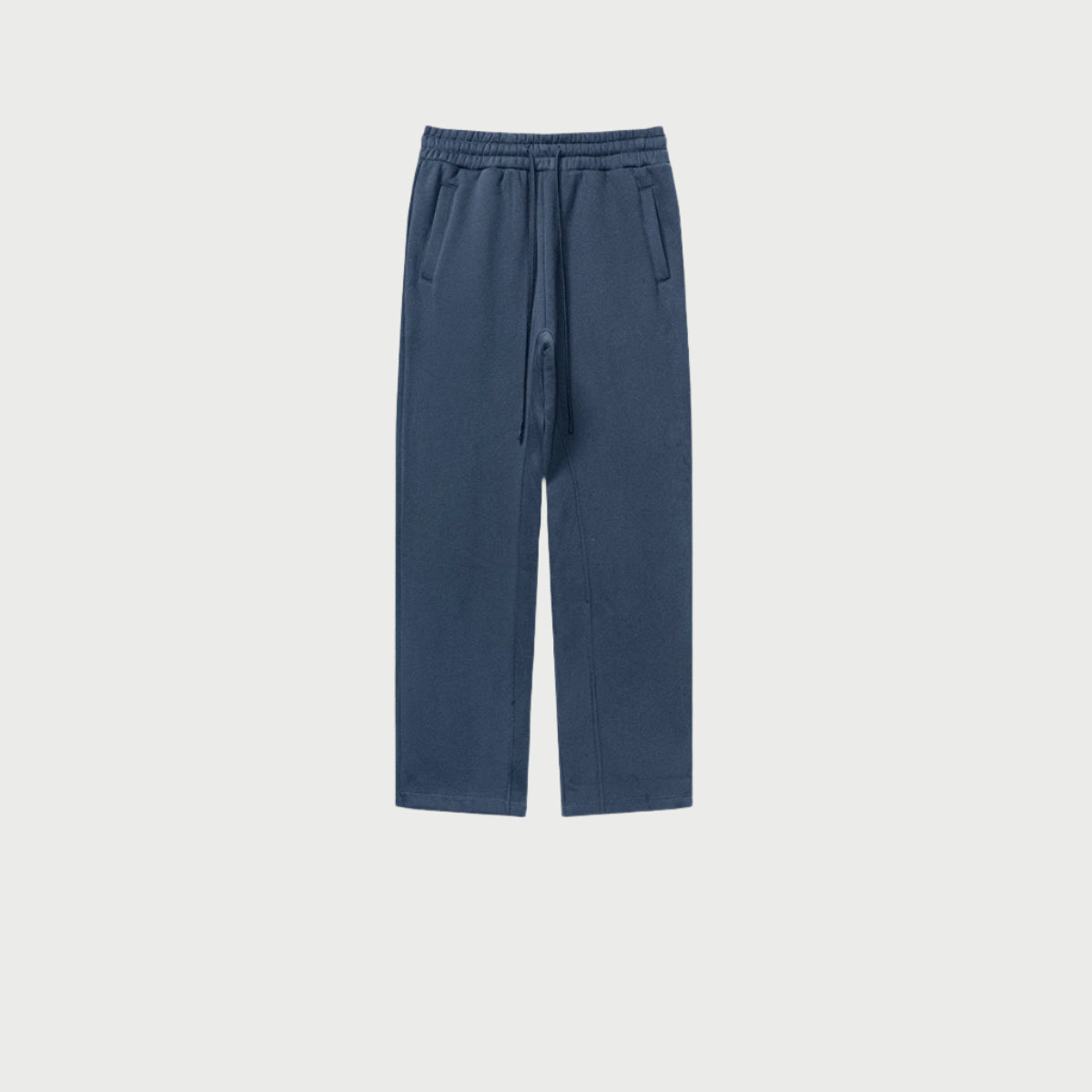 Navy blue sweatpants with elastic waistband, drawstring and side pockets displayed on light gray background