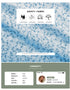  Close-up of blue floral fabric with icons highlighting the dress’s soft, breathable, and comfortable material