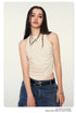 Front detail of off-white tank showing gathered side seams