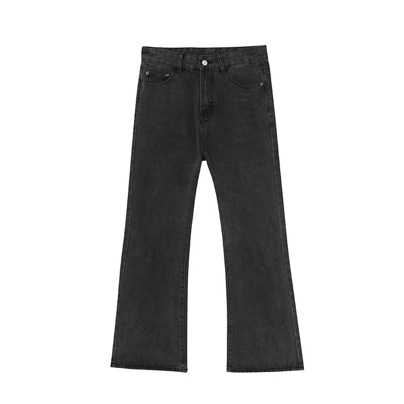 Washed black straight-leg jeans laid flat showing subtle fade details and slight flare design against white background