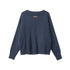 Back view of navy V-neck sweater with simple clean back design, ribbed hem and cuffs with distressed edges.