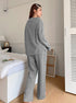 Back view of gray loungewear set showing relaxed fit and wide-leg pants silhouette