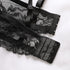 Close-up detail of black lace bra band showing hook-and-eye closure and scalloped lace trim pattern