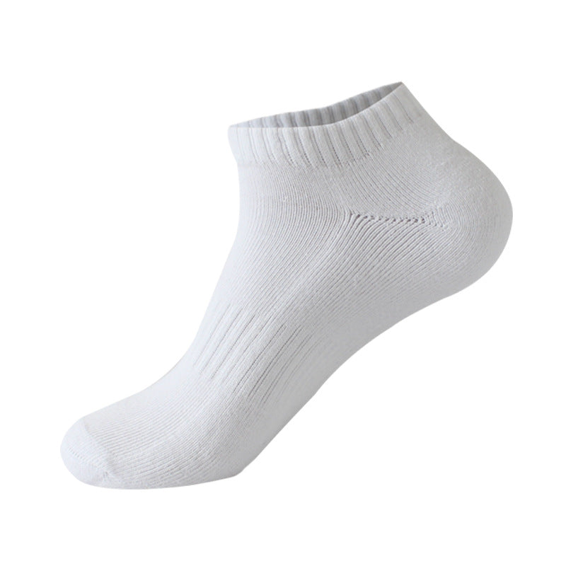 Single white ankle sock – A single white ribbed ankle sock isolated on a white background, displaying its breathable material and stretchable design