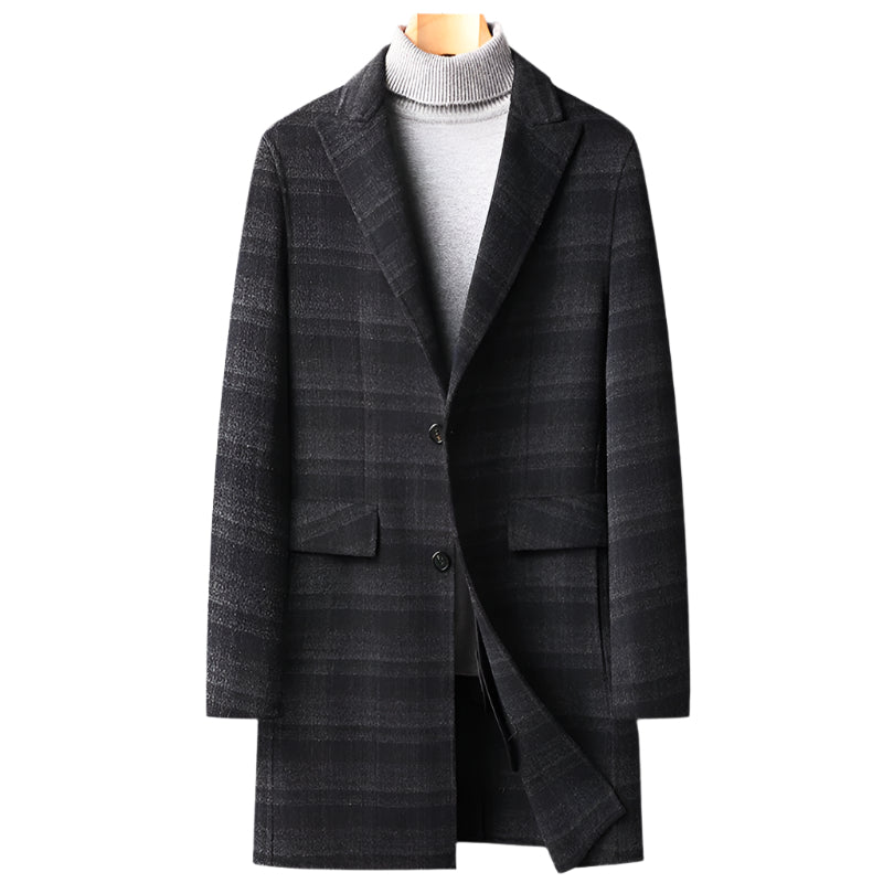 Black plaid overcoat with a notched lapel, worn over a gray turtleneck sweater