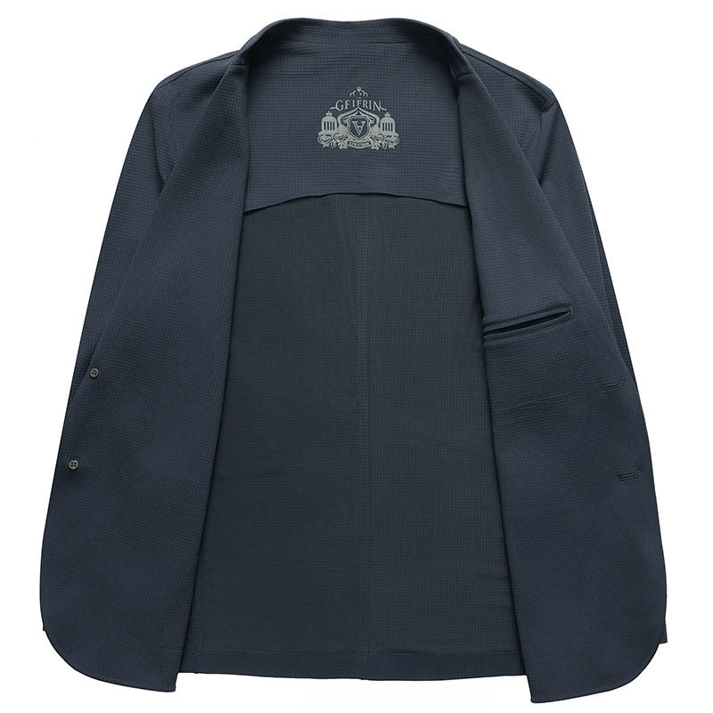 Interior view of navy GFJFRIN blazer showing lining, inner pockets and embroidered brand logo on back panel