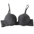Black push-up bra with molded cups and adjustable straps on white background