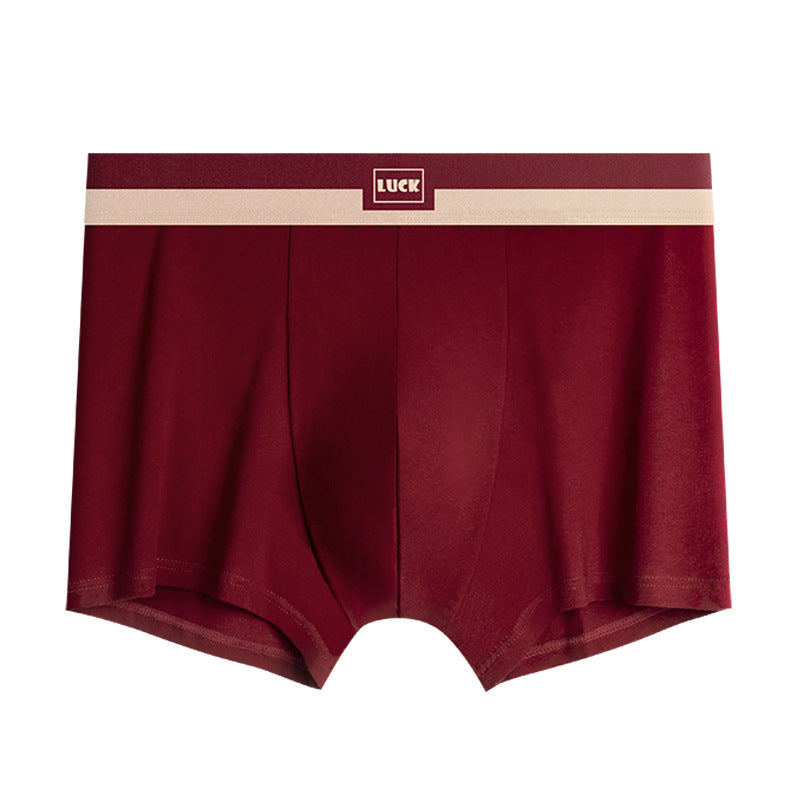 Burgundy men's boxer briefs with 'LUCK' logo and cream stripe waistband against white background