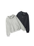 Two hooded sweatshirts displayed side by side - one in light gray and one in black, featuring snap-button hood details and embroidered logo on chest