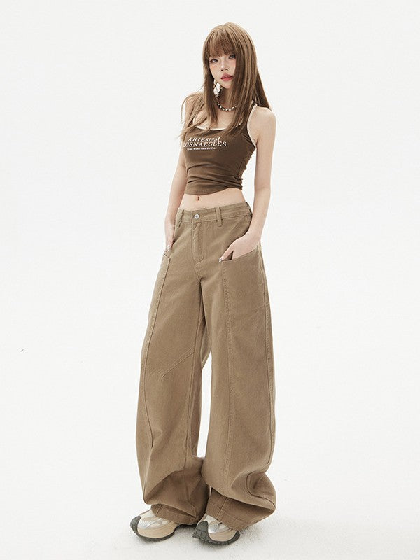 Side view, hands-in-pocket pose showing relaxed wide-leg silhouette.