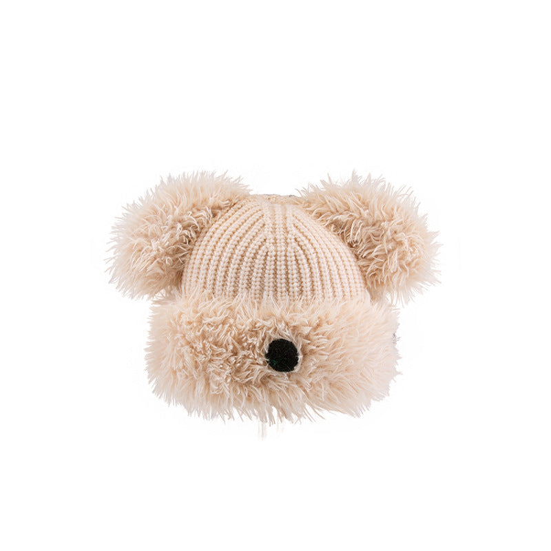 Beige Dog Nose Plush Knit Beanie and plush faux fur trim, front view close-up shot