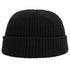 A black ribbed knit beanie with folded cuff displayed against white background, showing close-up texture of classic fisherman style
